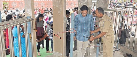Devotees going through door frame metal detectors at Kanaka Durga temple in Vijayawada| Prasant Madugula