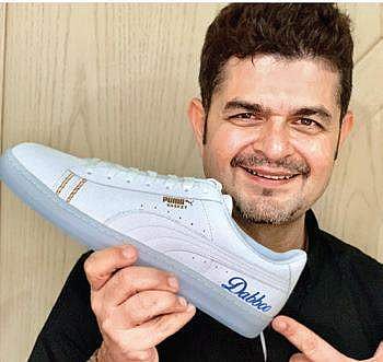 Photographer Dabboo Ratnani with  shoe customised by Vaishak