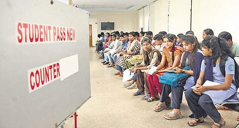 Students from the city and outskirts wait for their turn at a counter set up at Majestic bus stand to get their bus passes | shriram BN