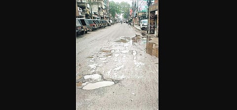 Rainwater filled potholes on Bisra-Panposh road | Express
