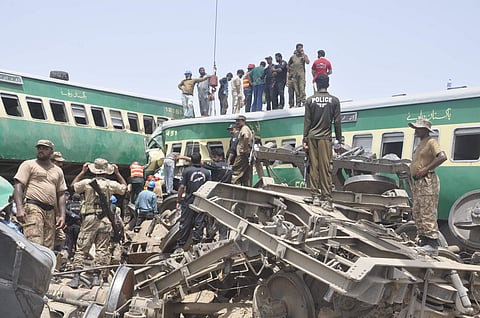 A passenger train rammed into a freight train in southern Pakistan on 11 July 2019, killing many people and injuring several. (Photo | AP)