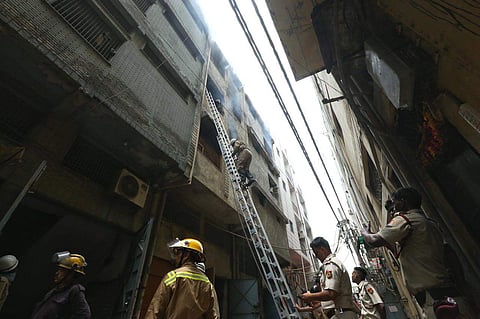 Firemen at work to douse the fire at Jhilmil colony in rubber factory in Delhi.  (Photo |  Arun Thakur, EPS)