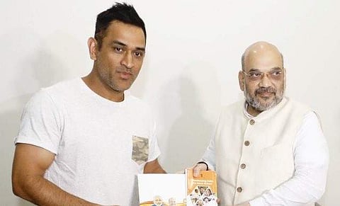 Dhoni was one of the celebrities whom BJP chief Amit Shah visited in his 'Sampark for Samarthan' programme ahead of Lok Sabha elections. (Photo | Twitter)
