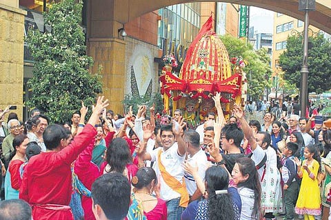 Devotees pulling chariot in Japan