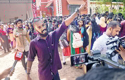 SFI workers stopping mediapersons from covering the protests on the campus after a student was stabbed during an altercation involving SFI unit members on Friday  | Vincent Pulickal