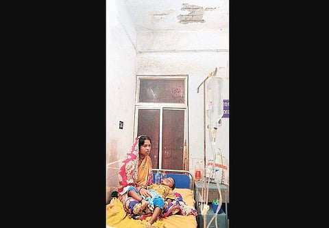 The toddler and his mother in the diarrhoea ward of DHH in Jagastinghpur. (Photo | EPS )