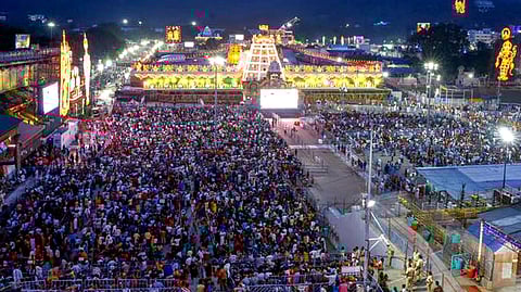 Devotees gather to witness the Garuda Seva at Tirumala temple. (Photo | Madhav K, EPS)
