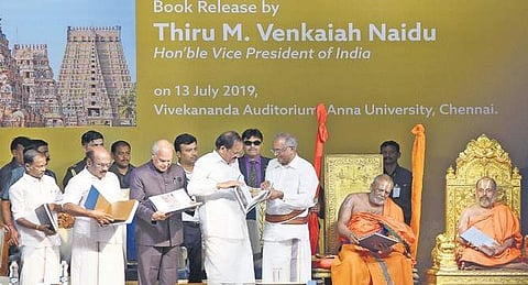 (From left) Sevvoor S Ramachandran, Minister for HR&CE, D Jayakumar, Minister for Fisheries, Banwarilal Purohit, Governor, Venkaiah Naidu, Vice-President, Venu Srinivasan, Chairman, TVS motors, Vanamamalai Jeeyar and Sri Varaha Andavan Swamigal at the boo