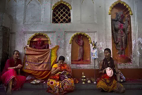 Devotees perform rituals beside idols of goddess Kamakhya during Ambubachi festival at the Kamakhya temple in Gauhati, India. (Photo | AP)