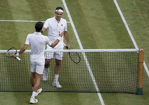 For nearly five tight, tense and terrific hours, Novak Djokovic and Roger Federer traded the lead, playing on and on and on until an unprecedented fifth-set tiebreaker was required to settle their memorable Wimbledon final. (Photo | AP)