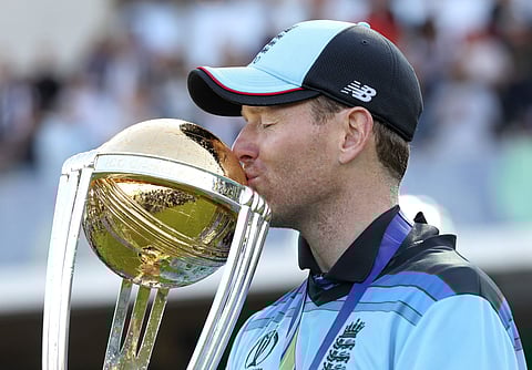 England's captain Eoin Morgan kisses the trophy after winning the Cricket World Cup final match between England and New Zealand at Lord's cricket ground in London. (Photo | AP)