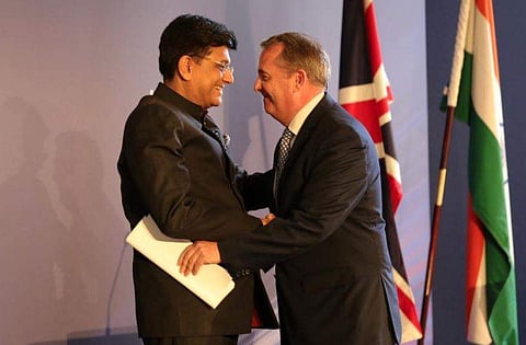 Commerce Minister Piyush Goyal(L) hugs UK board of Trade president Liam Fox at the UK-India JETCO meet (Photo | Twitter/@tradegovukIND)Commerce Minister Piyush Goyal(L) hugs UK board of Trade president Liam Fox at the UK-Indias JETCO meet (Photo | Twitter