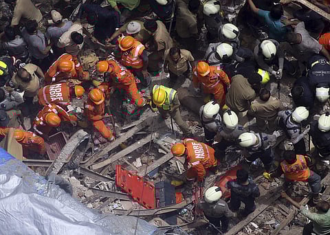 The century-old building in South Mumbai collapsed on Tuesday morning. (Photo | AP)