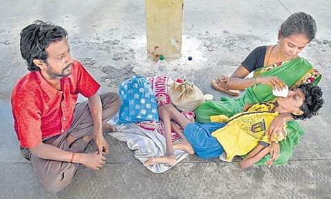 Guru Lakshmi with her son Guru Surya and Venkatesh. (Photo | Martin Louis, EPS)