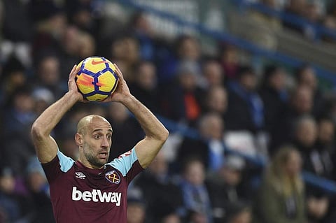 The veteran Argentine defender has signed a new one-year deal with West Ham United | AFP