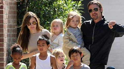 Angelina Jolie, Brad Pitt and their six kids before they split. (Photo | File, AP)