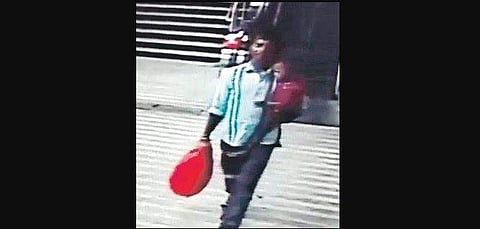 Cctv grabs of a middle aged man who kidnaps a three year old boy from the Central railway station and was seen taking him to the Park railway station on Sunday night. (Photo | EPS)