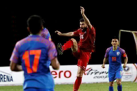 Sunil Chhetri looks on as Indian football players tussle for the ball with Syria player. (Photo | PTI)