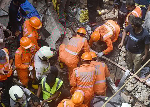 Rescue ops on at Mumbai building collapse site in Dongri. (Photo | PTI)