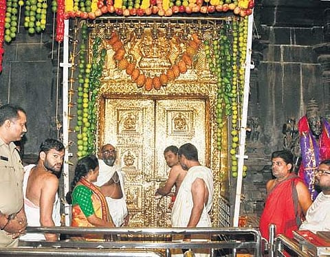 Temple authorities close the antaralayam of Durga temple in view of lunar eclipse in Vijayawada on Tuesday. (Photo | EPS)