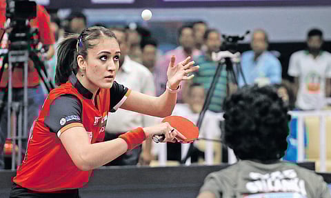 India’s Manika Batra hits a service against Sri Lanka’s Bimandi Bandara during their clash in the preliminary round on Wednesday | IRFANA