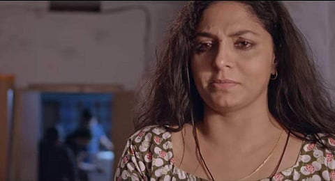 Still of Asha Sarath from 'Evidey' Malayalam movie. (Photo | YouTube Screengrab)
