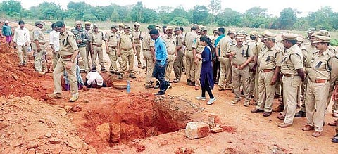 Forest officials building a wall in Chatakonda forest range in Kothagudem | Express
