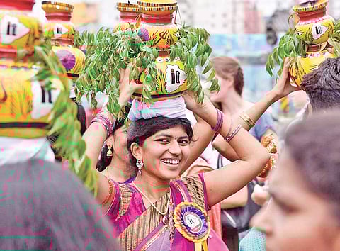 Youths soak in Bonalu spirit