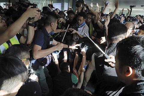 Police hold back protesters in Hong Kong ( File Photo | AP)