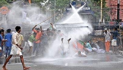 Police use water cannons to disperse Yuvamorcha activists demanding the ouster of college principal and action against culprits in stab case,  in front of University College on Monday  B P Deepu