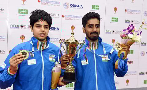 India's G Sathiyan and Archana G Kamat pose with their medals after winning the mix-doubles finals at 21st Commonwealth TT Championship in Cuttack | PTI
