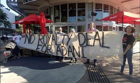 Protestors reminding  remind everyone that Adani should not receive public subsidies. | ( File Photo | Stop Adani Twitter )