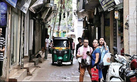 Lanes filled with North-eastern shops and restaurants at Humayunpur, New Delhi | Fatima Rezavi
