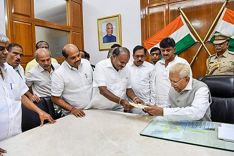 Karnataka Chief Minister HD Kumaraswamy submits his resignation to Karnataka Governor Vajubhai Vala after losing the vote of confidence in Bengaluru Tuesday July 23 2019. | PTI