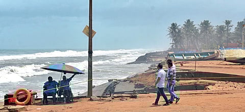 Lifeguards on duty stop tourists who enter the beach premises at Shanghumugham beach B P Deepu