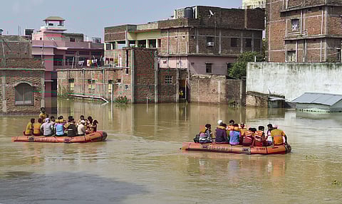 Residents being rescued from a flooded area in Sitamarhi, Bihar. (File Photo | PTI)