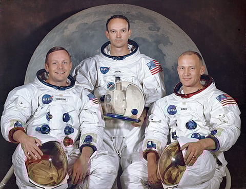 This March 30, 1969 photo made available by NASA shows the crew of the Apollo 11, from left, Neil Armstrong, commander; Michael Collins, module pilot; Edwin E. 'Buzz' Aldrin, lunar module pilot. Apollo 11 was the first manned mission to the surface of the