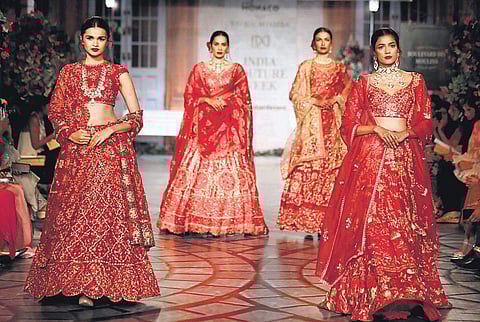 Models sashaying the ramp in Rahul Mishra’s latest collection fused by memories of a trip to Monaco and his childhood at Malhausi, UP