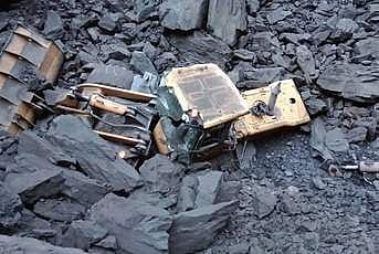 Debris at the mishap site in Bharatpur open cast coal mine