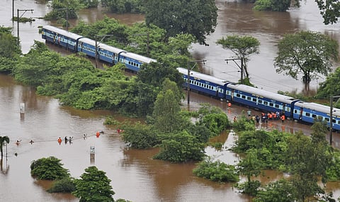 700 people were stranded on board Mumbai-Kolhapur Mahalaxmi Express about 60 km out of Mumbai on 27 July 2019 after heavy rains paralysed the city and its surrounding areas. | PTI