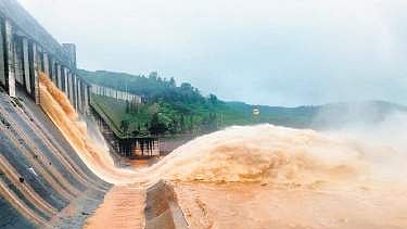 Water being released from a sluice gate of Upper Kolab Dam.