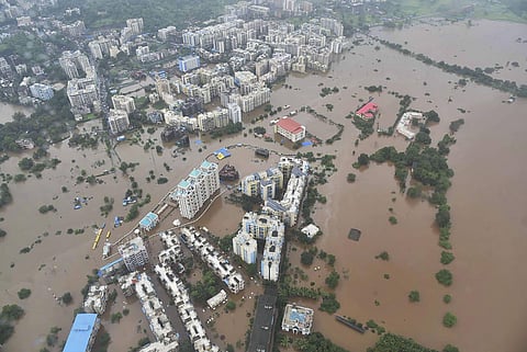 A birds eye view shows a flooded area following heavy monsoon rain in Thane district Saturday July 27 2019. | PTI