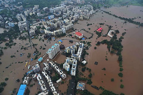 A bird’s eye view shows a flooded area following heavy monsoon rain in Thane district in Maharashtra Saturday July 27 2019. (Photo | PTI)