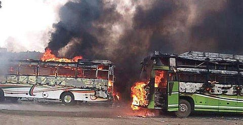The buses being gutted at the private Omni bus terminus in Koyambedu on Saturday evening | EXPRESS