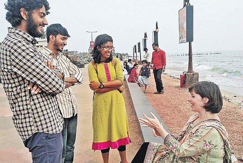 Elizabeth Keyton with her Instagram followers on the Kozhikode beach on Saturday
