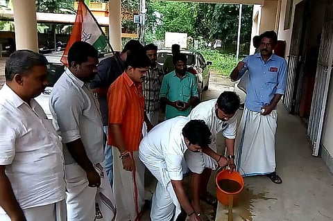 The symbolic 'purification ceremony' conducted by Youth Congress workers in protest against a stir by a Dalit CPI MLA has triggered a controversy (Photo | Facebook)