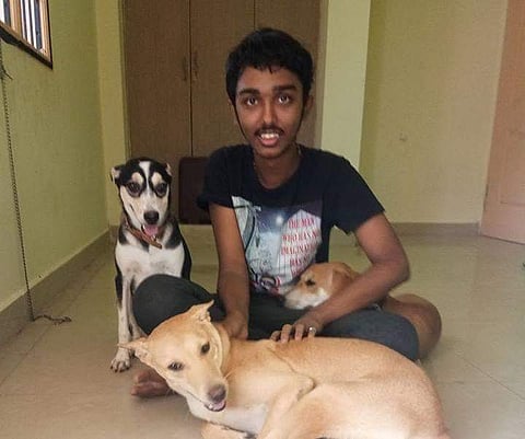 Sai Vignesh with his dogs (Photo | EdexLive)