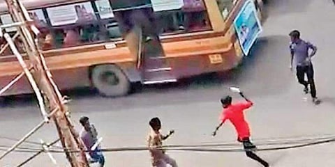 The students with sickles were seen pulling down boys from the opposite gang from the bus and attacking them on the road in full public view