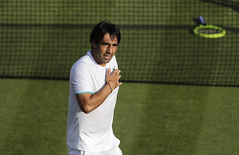 Marcos Baghdatis of Cyprus reacts after after losing to Italy's Matteo Berrettini in a Men's singles match during day four of the Wimbledon Tennis Championships in London. (Photo | AP)