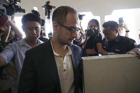Riza Aziz, stepson of Malaysian former Prime Minister Najib Razak, walks into a court room at Kuala Lumpur High Court in Kuala Lumpur (Photo | AP)